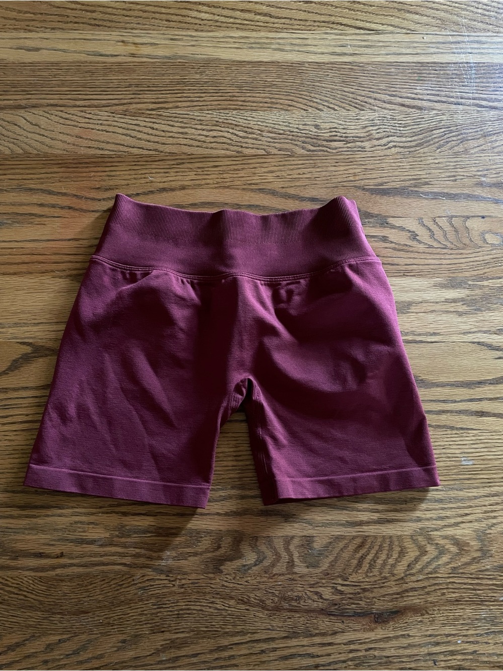 YoungLA for her maroon shorts